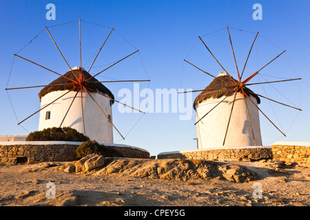Tow of the five historic windmills at Mykonos in the early morning sun Stock Photo