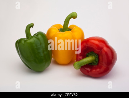 Group of red, yellow and green peppers isolated on white background Stock Photo