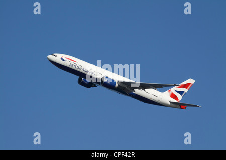 A British Airways Boeing 777 takes off from Logan International Airport. Stock Photo