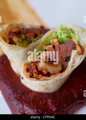 A variation of a traditional Northern China dish, Green Onion Beef Pancake roll, or Niu Rou Juan Bing. March 16, 2011. Stock Photo