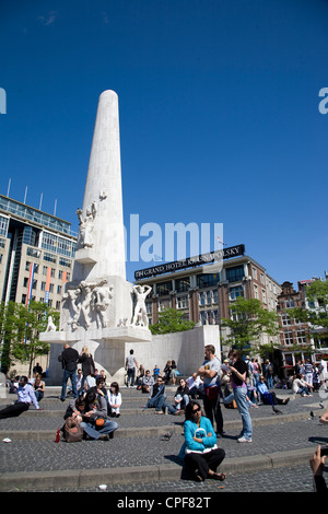 Dam Square. National Monument. Verwelius and Grand Hotel Krasnapolsky buildings. Amsterdam. Netherlands. Stock Photo