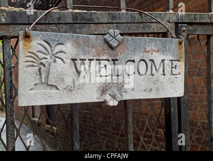welcome sign on metal gate Stock Photo
