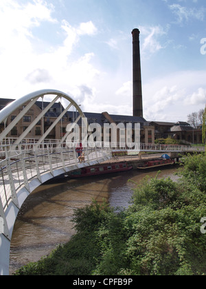 Riverside bridge over the River Cam with Cambridge Museum of Technology in the background, UK Stock Photo