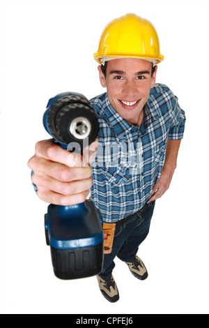 Tradesman holding a power tool Stock Photo