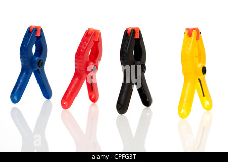 Four mini plastic clamps Stock Photo
