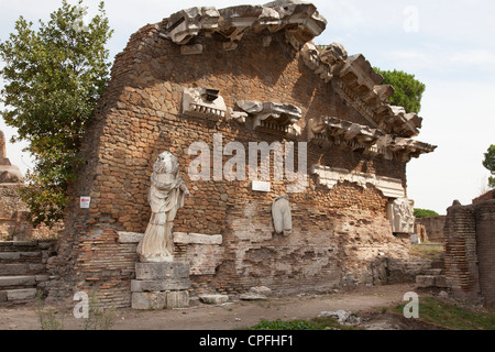 Fragments including the statue Goddess Roma at The ancient roman port town ruin of Ostia near Rome Stock Photo