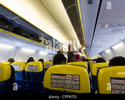 Passengers inside a Ryanair plane Stock Photo - Alamy