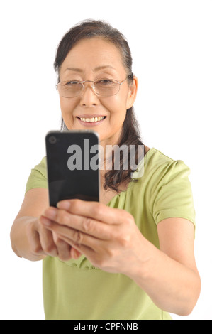 Senior woman using smartphone Stock Photo