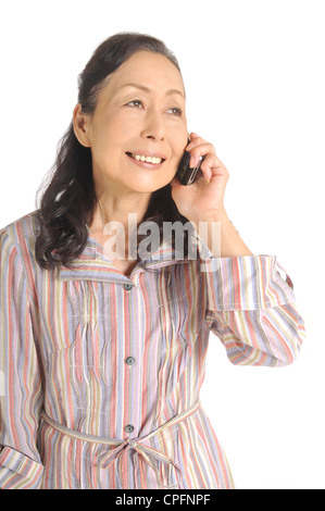Senior woman talking on mobile phone Stock Photo