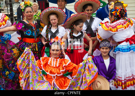 A group of Mexican dancers posing for a group photograph Stock Photo