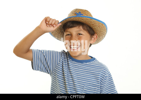 Happy cheerful smiling young boy in toy cowboy hat - on white background Stock Photo