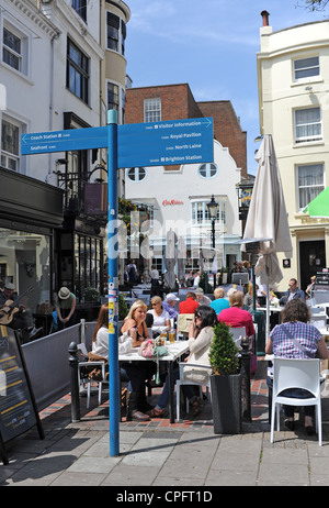 Outdoor al fresco style cafe restaurant bars in East St Brighton city centre The Lanes area Sussex UK Stock Photo