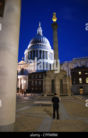 St. Paul's Cathedral Paternoster Column and the Temple Bar, Paternoster Square, London EC4, England with a man standing in front Stock Photo