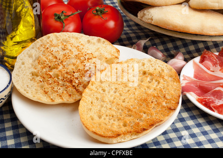 Typical breakfast mollete with ham tomato and oil Antequera Malaga Andalusia Spain