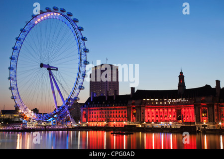 England, London, London Eye and County Hall Building Stock Photo