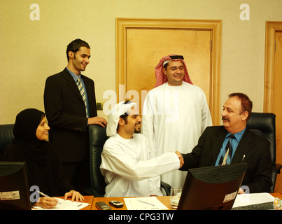 Small group of Business persons in a discussion Stock Photo