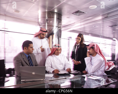 Businessman relaxing in a conference room Stock Photo