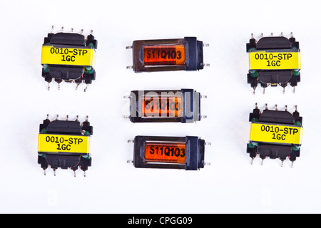 SMT / SMD transformers used to assembly PCB's printed circuit in the electronics industry, electronics devises. Stock Photo