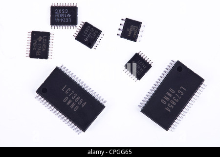 Various IC's (intergrated circuit) chips used in the assembly of SMT / SMD printed circuit boards in the electronics industry. Stock Photo