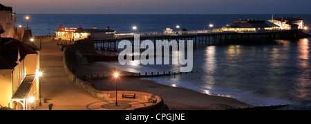 Dusk colours over the Pavilion Theatre pier at Cromer, North Norfolk Coast, England, UK Stock Photo