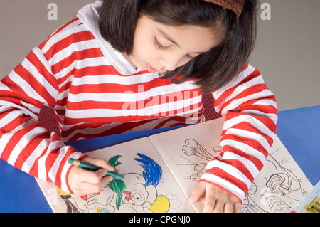 Girl (6-7) coloring sketch, elevated view Stock Photo