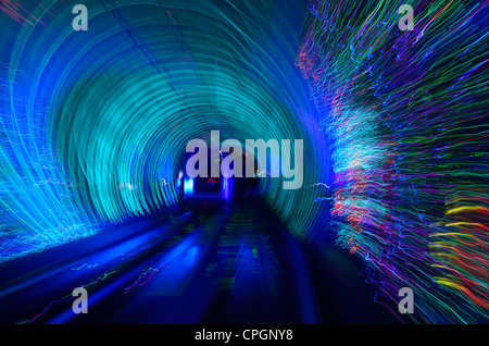 Automated cab car with streaking blue lights in the Bund Sightseeing Tunnel under the Huangpu River Shanghai China Stock Photo