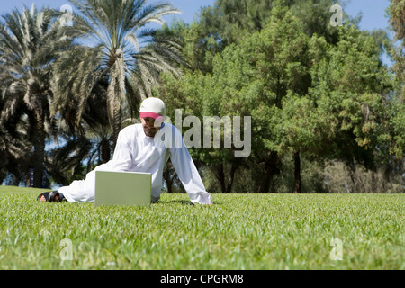 Young man using laptop Stock Photo