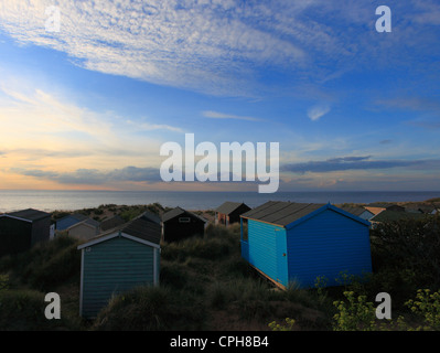 Beach huts in the sand dunes at Old Hunstanton, Norfolk, England, UK. Stock Photo