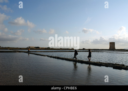 People at Saltworks Ettore & Infersa. Marsala, Trapani District, Sicily, Italy Stock Photo