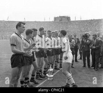 Blackburn Rovers captain Ronnie Clayton congratulates the 1960 FA Cup winners Wolverhampton Wanderers 7/5/60 Stock Photo