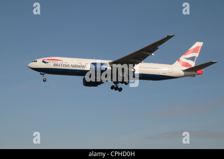 A British Airways Boeing 777-236(ER) (G-YMML) about to land at Heathrow Airport, London, UK. Stock Photo