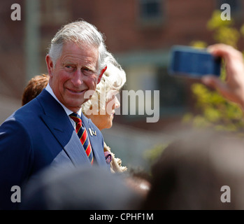 Charles, Prince of Wales, takes part in a ceremony with Camilla, Duchess of Cornwall, May 21, 2012, in Saint John, Canada. Stock Photo