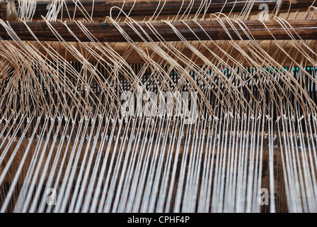 part of loom white thread homemade horizontal Stock Photo