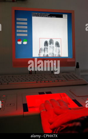 Police, taking fingerprints, digitally from a suspect person Stock ...