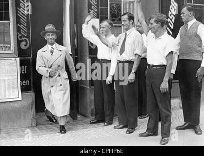 Joseph Goebbels Leaving a Polling Place During a Plebiscite Against the Young- Plan, 1931 Stock Photo