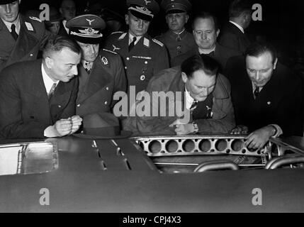 Wilhelm Kissel, Ernst Udet and Hermann Goering at a car show, 1937 Stock Photo