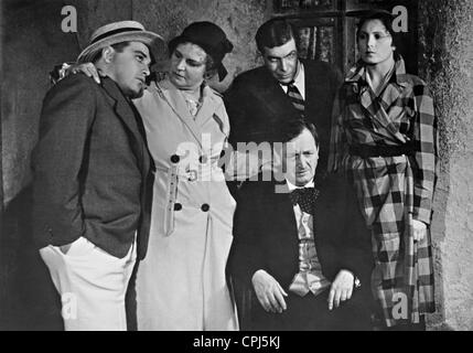 Peter Lorre, Lucie Hoeflich, Hans Heilinger, Hans Moser and Carola Neher, 1931 Stock Photo