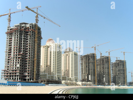 New apartment tower under construction at new Pearl Doha land reclamation property development area in Doha Qatar Stock Photo