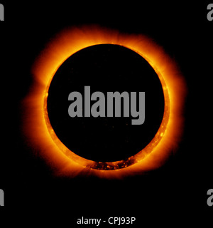 Image captured in space of the annular eclipse of the Sun taken by the Hinode mission May 20, 2012.  During an annular eclipse the moon does not block the entirety of the sun, but leaves a bright ring of light visible at the edges Stock Photo