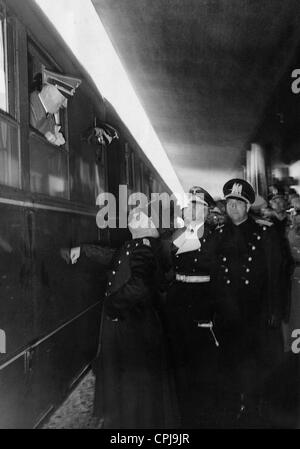 Benito Mussolini and Count Galeazzo Ciano welcome Adolf Hitler at the station, 1940 Stock Photo
