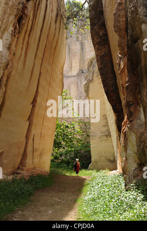 A woman walks though the Santa Ponca-Quarry, Menorca, Spain Stock Photo