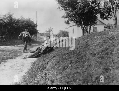 Soldiers of the Waffen-SS at fighting at a location, 1942 Stock Photo