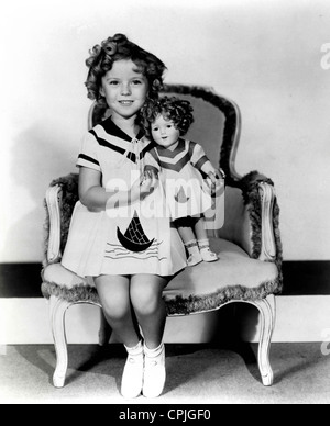 Shirley Temple with a Shirley Temple doll, ca. 1935 Stock Photo - Alamy