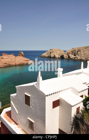 Villa overlooking bay, Cala Morell, Menorca, Balearic Islands, Spain Stock Photo