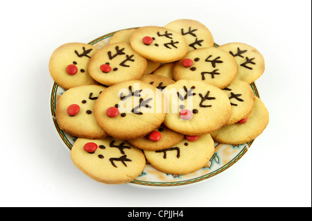 Christmas reindeer cookies on plate isolated on white Stock Photo