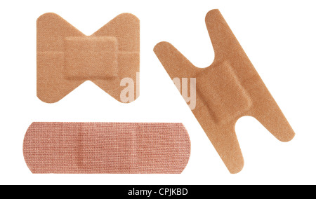 Set of three bandaids or bandages in various shapes over white. Stock Photo