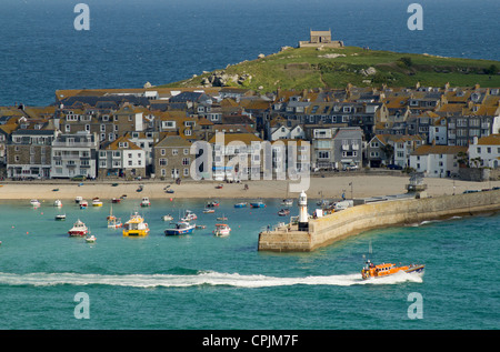 St. Ives Lifeboat leaving the harbour, Cornwall UK. Stock Photo