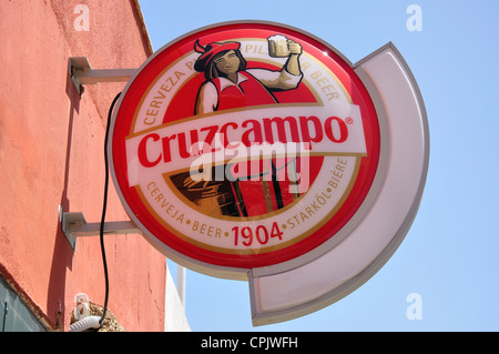 Cruzcampo Beer sign in The Marina at Cala en Bosc, Menorca (Minorca), Balearic Islands, Spain Stock Photo