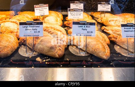 Pasty and pasties for sale in a shop in Exeter including Steak Pasty, Lamb and Mint and more Stock Photo