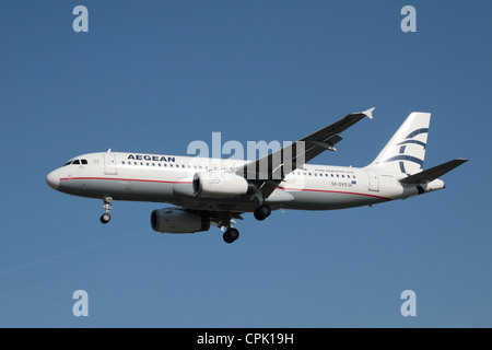 The Aegean Airlines Airbus A320-232 (SX-DVS) about to land at Heathrow Airport, London, UK. Feb 2012 Stock Photo